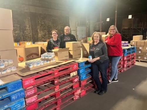 Pat, Nick, Kristy, Bev Packing Boxes